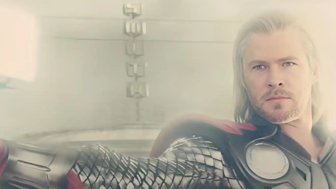 Thor donning his Asgardian armor